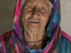Mother of Amran Jan Dario, poet, musician, guide's home, Zood Khun village, Chipurson Valley, tributary of Hunza Valley, Pakistan