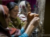 Weavers at Women's cooperative handicraft centre, Misgar village just north of Sost, Hunza Valley, Karakoram Range, Pakistan